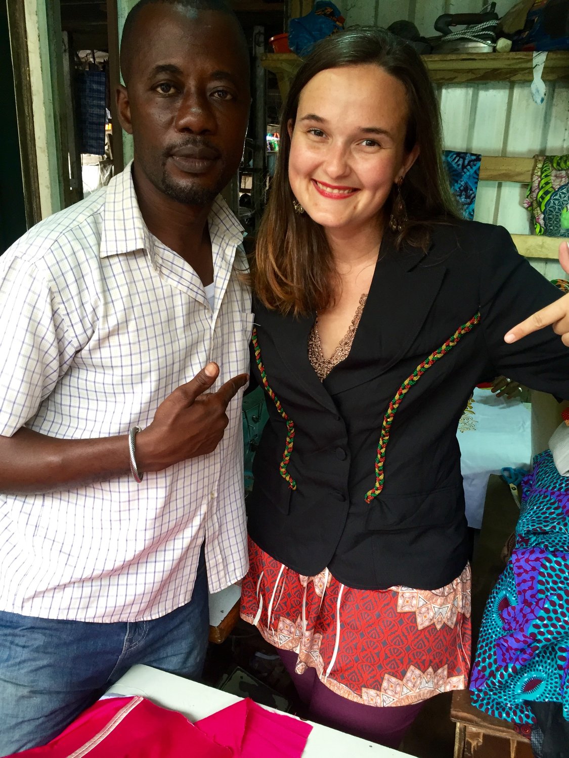 Morgan Hardy with Muta, the designer of items she used in her research. Taken in the downtown Accra market in Ghana, where he has a stall.